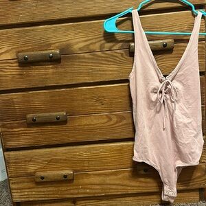 Pink bodysuit
